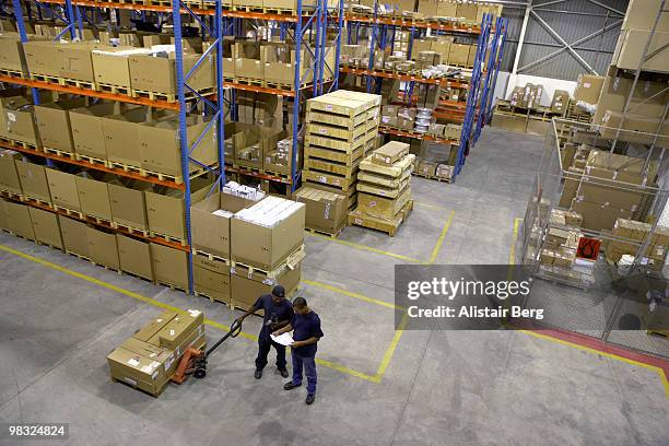 aerial view of warehouse - newbusiness stock pictures, royalty-free photos & images