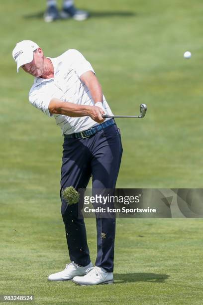 Steve Stricker hits his second shot on eighteen during the final round of the American Family Insurance Championship Champions Tour golf tournament...