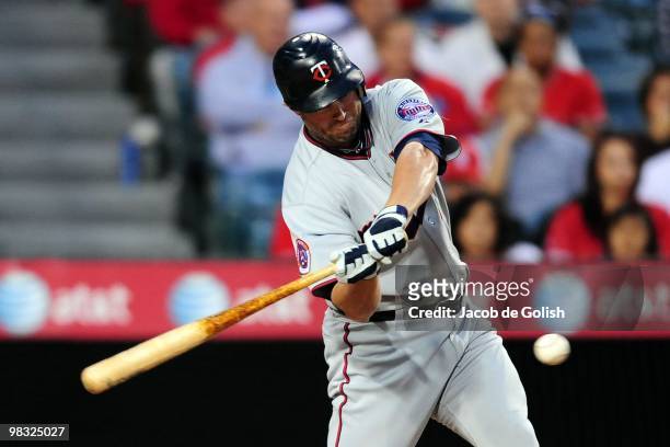 Michael Cuddyer of the Minnisota Twins bats while playing against the Los Angeles Angels of Anaheim on April 6, 2010 in Anaheim, California. The...