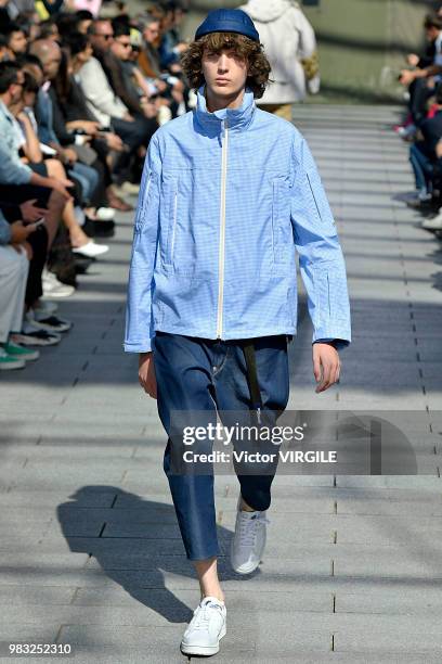 Model walks the runway during the Junya Watanabe Man Menswear Spring/Summer 2019 fashion show as part of Paris Fashion Week on June 22, 2018 in...