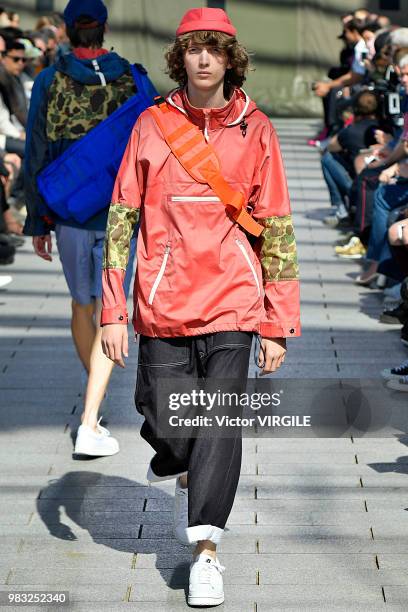 Model walks the runway during the Junya Watanabe Man Menswear Spring/Summer 2019 fashion show as part of Paris Fashion Week on June 22, 2018 in...