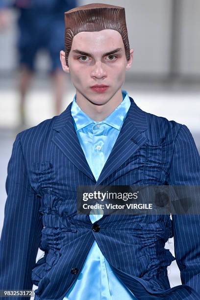 Model walks the runway during the Comme des Garcons Menswear Spring/Summer 2019 fashion show as part of Paris Fashion Week on June 22, 2018 in Paris,...