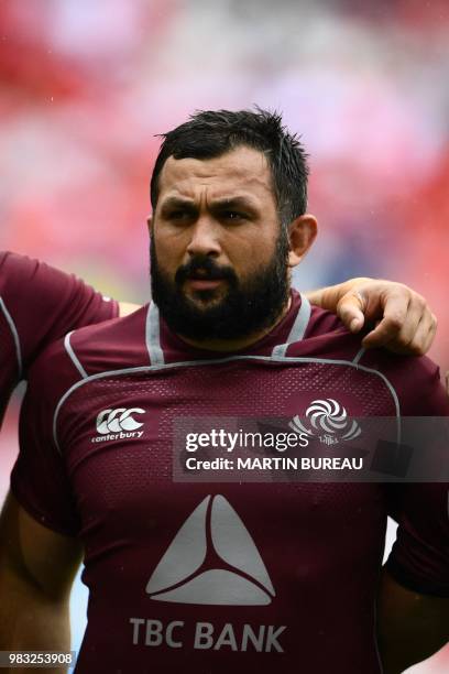 Georgia's prop Karlen Asieshvili poses as he listens to the anthems prior the rugby union Test match between Japan and Georgia at Toyota Stadium in...