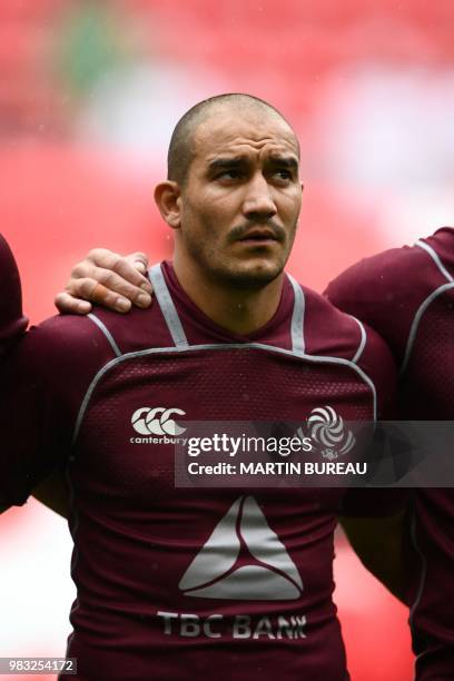 Georgia's scrum half Giorgi Begadze listens to the anthems prior the rugby union Test match between Japan and Georgia at Toyota Stadium in Toyota on...