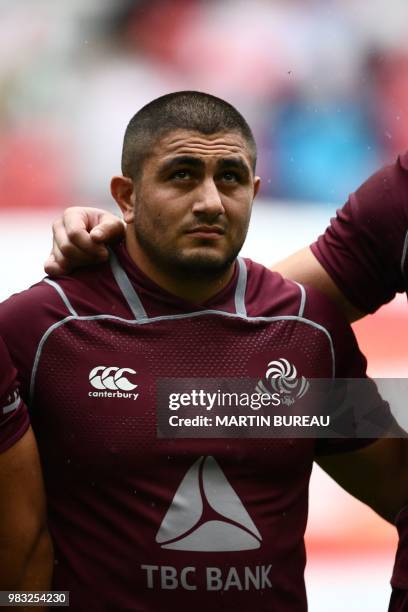 Georgia's prop Giorgi Melikidze listens to the anthems prior the rugby union Test match between Japan and Georgia at Toyota Stadium in Toyota on June...