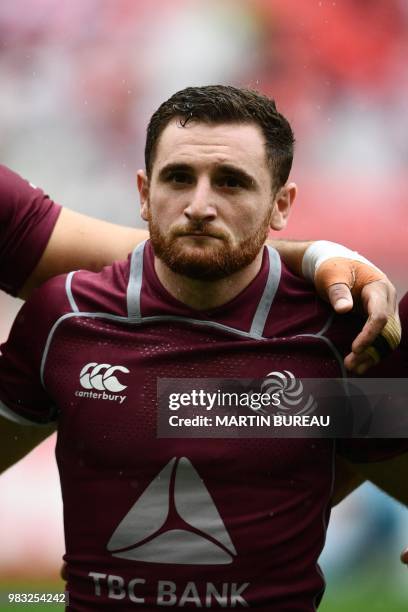 Georgia's scrum half Vasil Lobzhanidze listens to the anthems prior the rugby union Test match between Japan and Georgia at Toyota Stadium in Toyota...