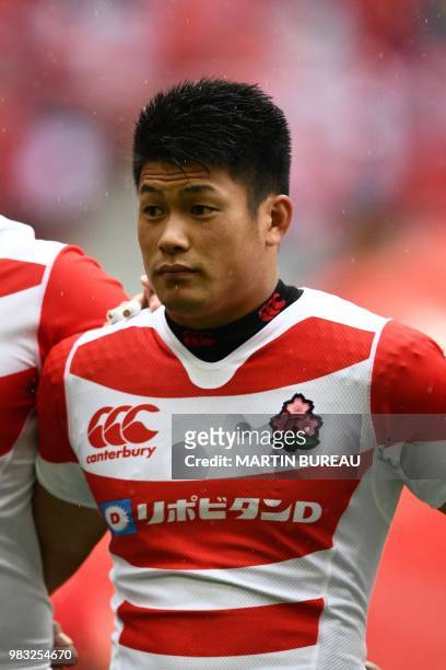 Japan's fullback Ryuji Noguchi listens to the anthems prior the rugby union Test match between Japan and Georgia at Toyota Stadium in Toyota on June...