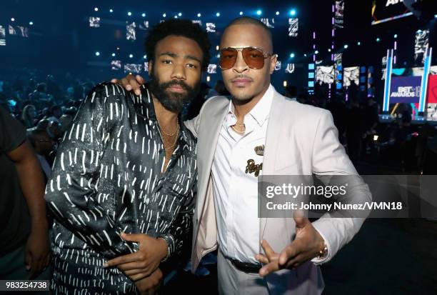 Donald Glover and Clifford "T.I." Harris are seen at the 2018 BET Awards at Microsoft Theater on June 24, 2018 in Los Angeles, California.