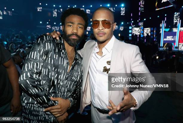 Donald Glover and Clifford "T.I." Harris are seen at the 2018 BET Awards at Microsoft Theater on June 24, 2018 in Los Angeles, California.