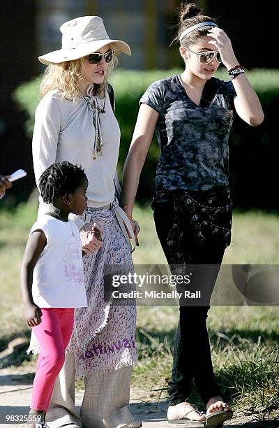 Madonna arrives with adopted Malawian Mercy James and Lourdes at one of the Raising Malawi initiative's - Mphandula Childcare Centre which supports...