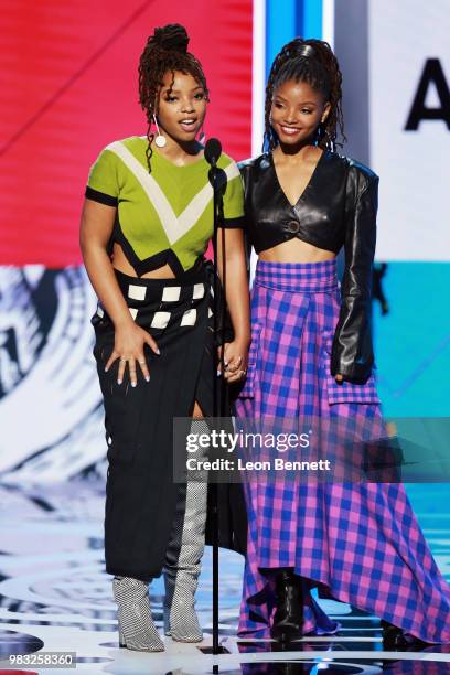 Chloe Bailey and Halle Bailey of Chloe X Halle speak onstage at the 2018 BET Awards at Microsoft Theater on June 24, 2018 in Los Angeles, California.