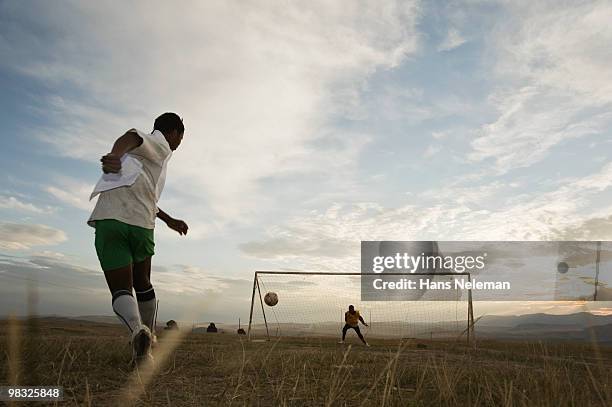 soccer players playing in a field, south africa - south africa training stock pictures, royalty-free photos & images