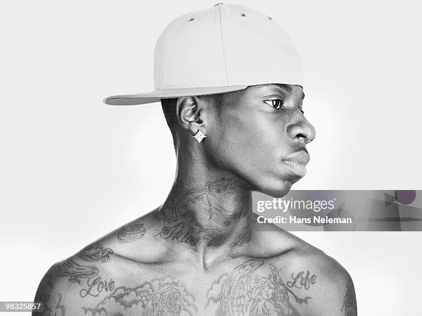 close-up of a hip hop dancer wearing a cap - hans neleman stockfoto's en -beelden