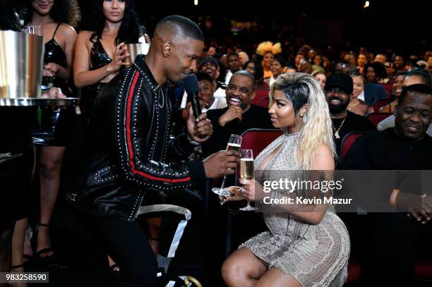 Host Jamie Foxx and Nicki Minaj speak during the 2018 BET Awards at Microsoft Theater on June 24, 2018 in Los Angeles, California.