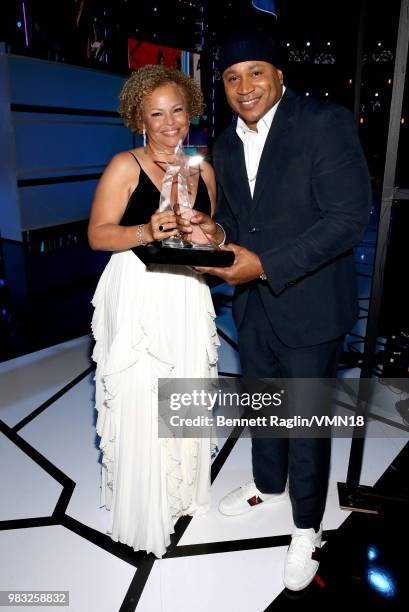 Debra L. Lee , recipient of the BET Ultimate Icon Award, poses with LL Cool J backstage at the 2018 BET Awards at Microsoft Theater on June 24, 2018...