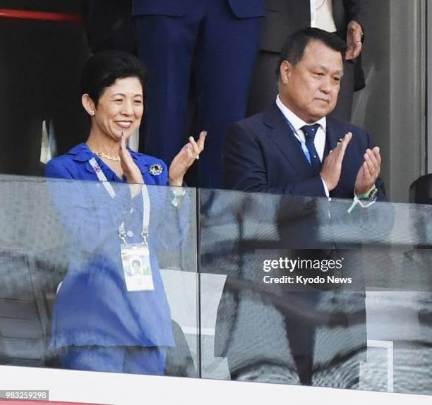 Japanese Princess Hisako , honorary patron of the Japan Football Association, and JFA President Kozo Tashima watch a World Cup Group H match between...