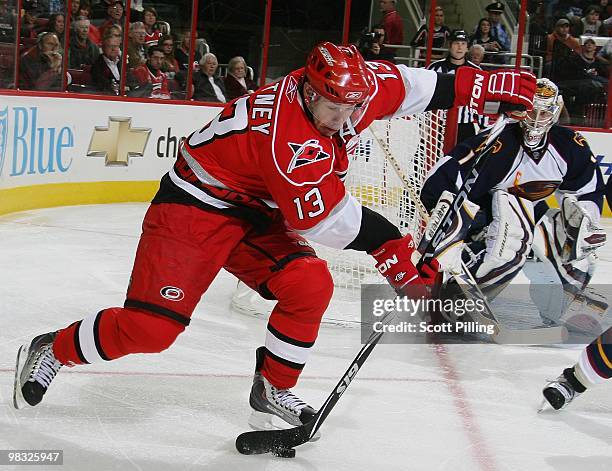 Ray Whitney of the Carolina Hurricanes sets up an offensive play inside the defensive zone of the Atlanta Thrashers during their NHL game on March...