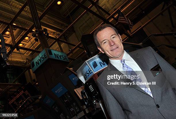 Actor Bryan Cranston poses for pictures on the trading floor after ringing the opening bell at the New York Stock Exchange on April 8, 2010 in New...