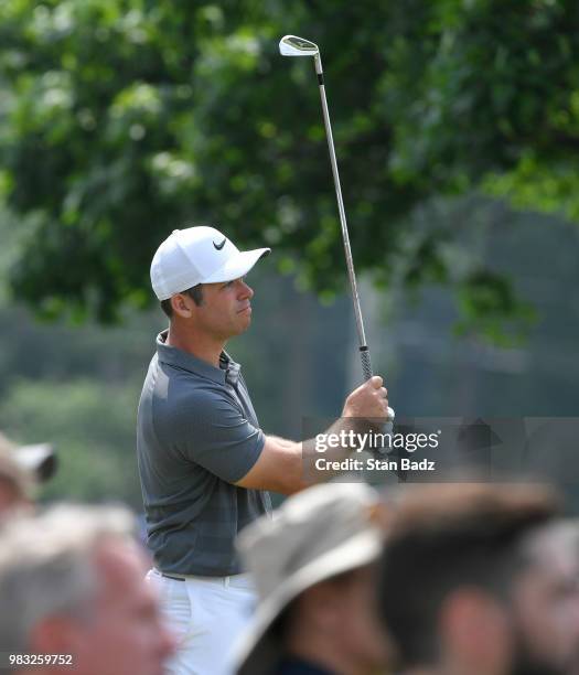 Paul Casey of England plays a tee shot on the fifth hole during the final round of the Travelers Championship at TPC River Highlands on June 24, 2018...