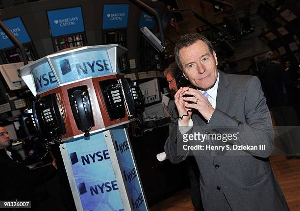 Actor Bryan Cranston poses for pictures on the trading floor after ringing the opening bell at the New York Stock Exchange on April 8, 2010 in New...