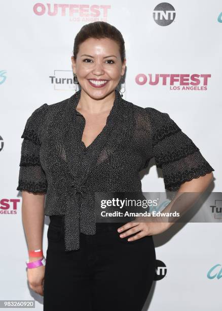 Actress Justina Machado arrives at a special screening of TNT's "CLAWS" with TurnOUT LA and OUTFEST at the Los Angeles LGBT Center on June 24, 2018...