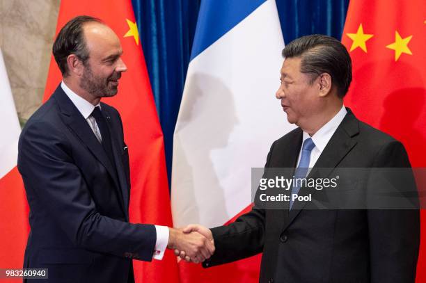 China's President Xi Jinping meets French Prime Minister Edouard Philippe at the Great Hall of the People in Beijing on June 25, 2018.