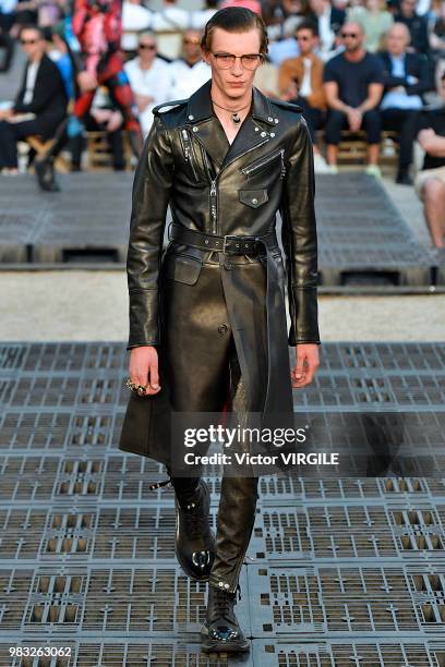 Model walks the runway during the Alexander McQueen Menswear Spring/Summer 2019 fashion show as part of Paris Fashion Week on June 22, 2018 in Paris,...