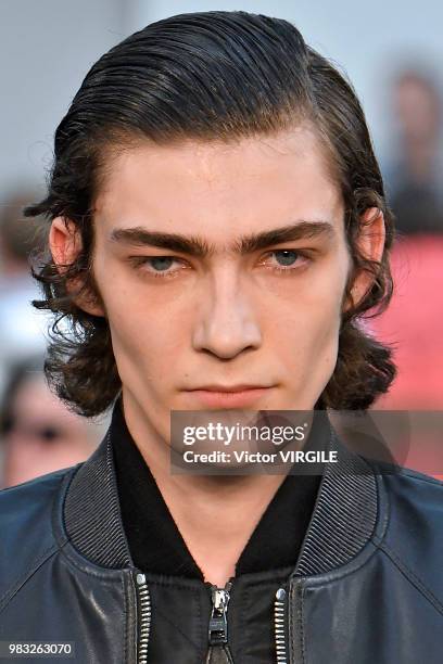 Model walks the runway during the Alexander McQueen Menswear Spring/Summer 2019 fashion show as part of Paris Fashion Week on June 22, 2018 in Paris,...