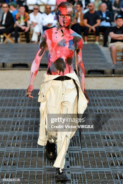 Model walks the runway during the Alexander McQueen Menswear Spring/Summer 2019 fashion show as part of Paris Fashion Week on June 22, 2018 in Paris,...