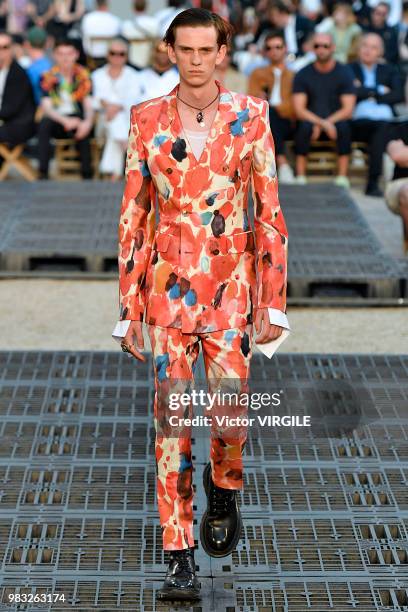 Model walks the runway during the Alexander McQueen Menswear Spring/Summer 2019 fashion show as part of Paris Fashion Week on June 22, 2018 in Paris,...