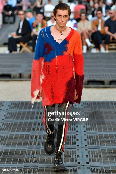 Model walks the runway during the Alexander McQueen Menswear Spring/Summer 2019 fashion show as part of Paris Fashion Week on June 22, 2018 in Paris,...