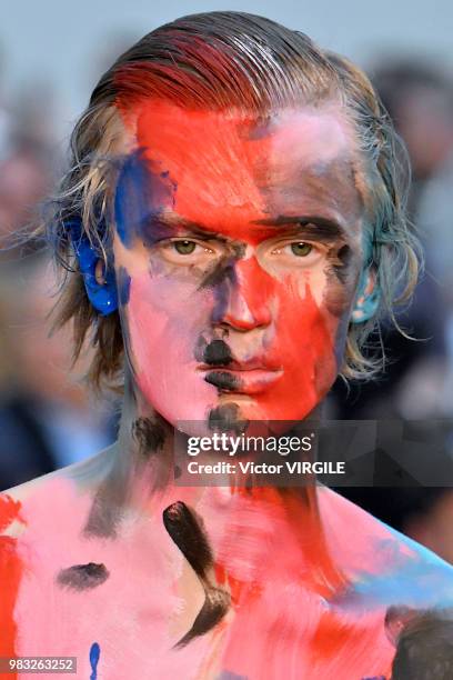 Model walks the runway during the Alexander McQueen Menswear Spring/Summer 2019 fashion show as part of Paris Fashion Week on June 22, 2018 in Paris,...