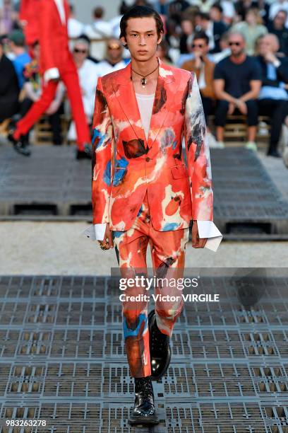 Model walks the runway during the Alexander McQueen Menswear Spring/Summer 2019 fashion show as part of Paris Fashion Week on June 22, 2018 in Paris,...