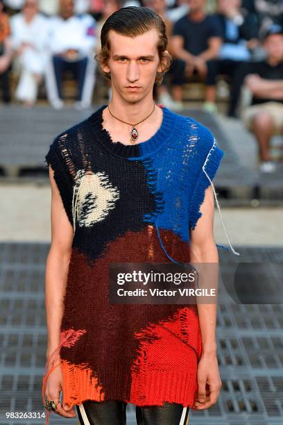 Model walks the runway during the Alexander McQueen Menswear Spring/Summer 2019 fashion show as part of Paris Fashion Week on June 22, 2018 in Paris,...