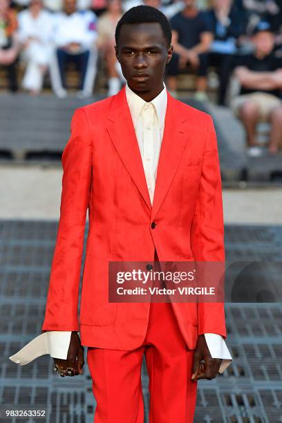 Model walks the runway during the Alexander McQueen Menswear Spring/Summer 2019 fashion show as part of Paris Fashion Week on June 22, 2018 in Paris,...