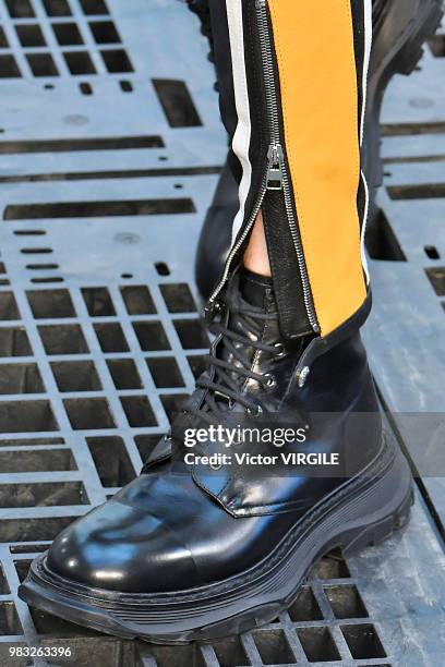 Model walks the runway during the Alexander McQueen Menswear Spring/Summer 2019 fashion show as part of Paris Fashion Week on June 22, 2018 in Paris,...