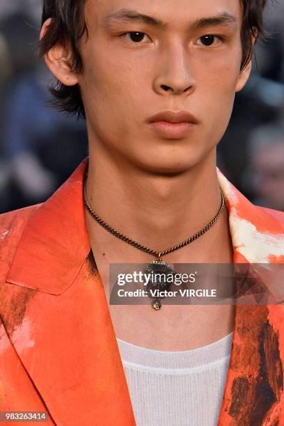 Model walks the runway during the Alexander McQueen Menswear Spring/Summer 2019 fashion show as part of Paris Fashion Week on June 22, 2018 in Paris,...