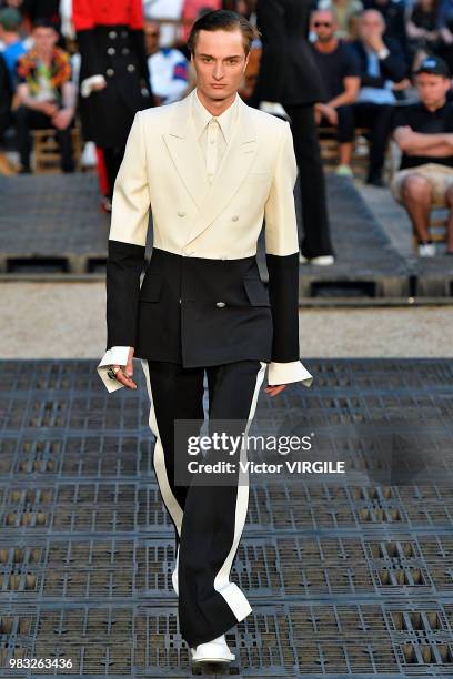 Model walks the runway during the Alexander McQueen Menswear Spring/Summer 2019 fashion show as part of Paris Fashion Week on June 22, 2018 in Paris,...