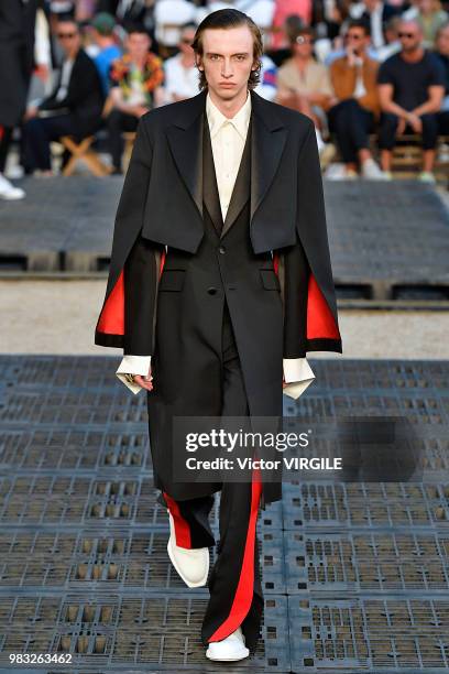 Model walks the runway during the Alexander McQueen Menswear Spring/Summer 2019 fashion show as part of Paris Fashion Week on June 22, 2018 in Paris,...