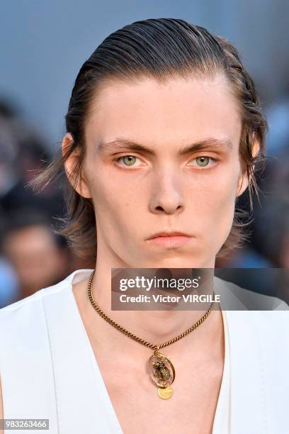 Model walks the runway during the Alexander McQueen Menswear Spring/Summer 2019 fashion show as part of Paris Fashion Week on June 22, 2018 in Paris,...