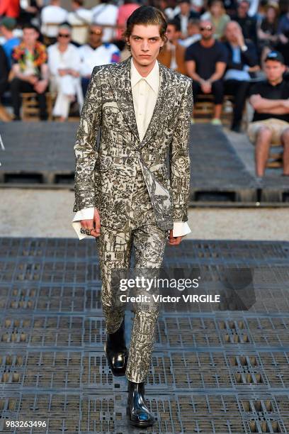 Model walks the runway during the Alexander McQueen Menswear Spring/Summer 2019 fashion show as part of Paris Fashion Week on June 22, 2018 in Paris,...