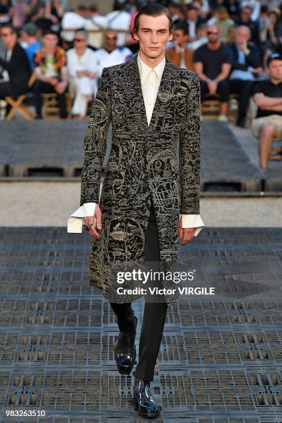 Model walks the runway during the Alexander McQueen Menswear Spring/Summer 2019 fashion show as part of Paris Fashion Week on June 22, 2018 in Paris,...