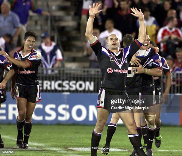 Awen Guttenbeil and Logan Swann of the Warriors celebrate beating the Broncos in the round 6 NRL Rugby League match between the Auckland Warriors and...