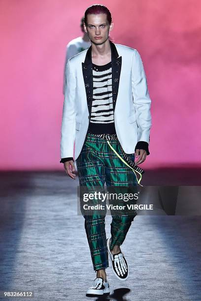 Model walks the runway during the Amiri Menswear Fall/Winter 2018-2019 show as part of Paris Fashion Week on January 19, 2018 in Paris, France.