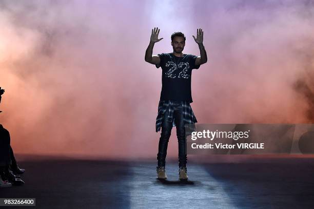 Fashion designer Mike Amiri walks the runway during the Amiri Menswear Fall/Winter 2018-2019 show as part of Paris Fashion Week on January 19, 2018...