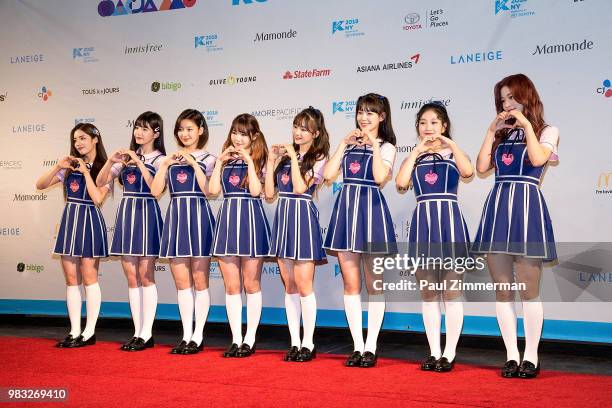 Roh Ji Sun, Song Ha Young, Lee Sae Rom, Lee Chae Young, Lee Na Gyung, Park Ji Won, Lee Seo Yeon, Baek Ji Heon and Jang Gyu Ri of girl band Fromis_9...