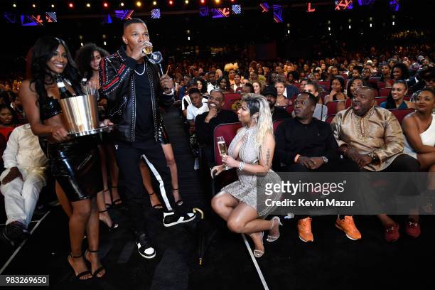 Host Jamie Foxx and Nicki Minaj speak during the 2018 BET Awards at Microsoft Theater on June 24, 2018 in Los Angeles, California.