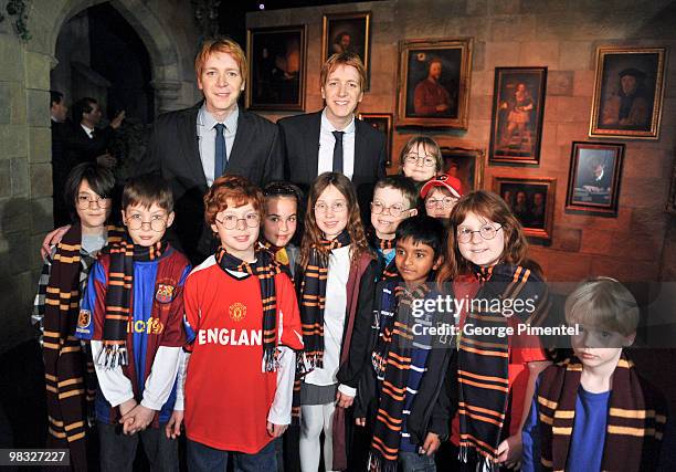 Actors James Phelps , Oliver Phelps and students attend Harry Potter: The Exhibition at the Ontario Science Centre on April 8, 2010 in North York,...