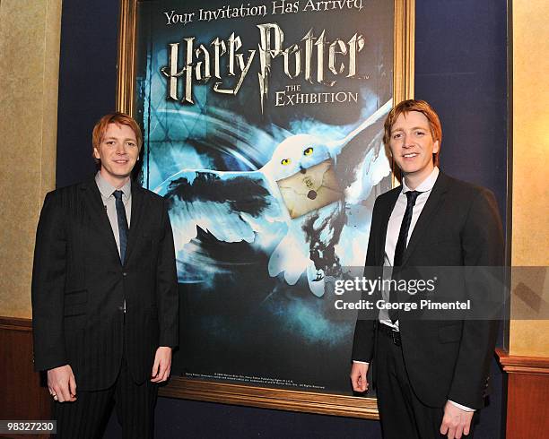 Actors James Phelps and Oliver Phelps attend Harry Potter: The Exhibition at the Ontario Science Centre on April 8, 2010 in North York, Canada.