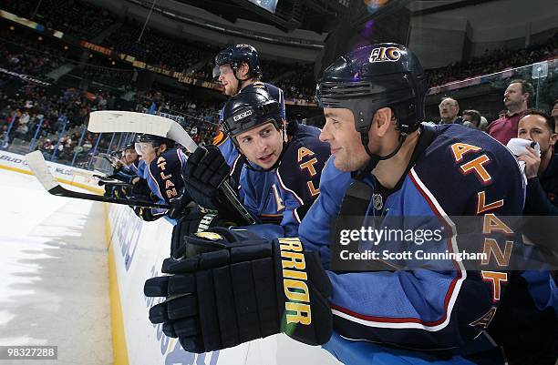 Colby Armstrong and Marty Reasoner of the Atlanta Thrashers chat while on the bench during the game against the Phoenix Coyotes at Philips Arena on...